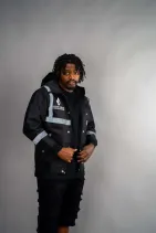 Industrial Work Jacket 10 Model wearing the Reign Gear black and gray industrial work jacket