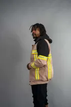 Reflective Work Jacket 2 Model wearing the Reign Gear hooded reflective industrial work jacket