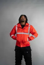 Industrial Work Jacket 3 Model wearing the Reign Gear high-visibility reflective safety jacket