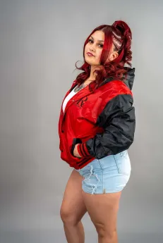 Classic Nylon Jacket 7 Reign Gear women's red and black water-repellent nylon hooded varsity jacket.