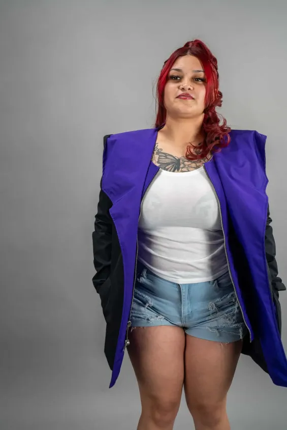 Two Tone Trench Coat 1 Reign Gear women's purple and black hooded varsity jacket