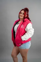 Zipper Varsity Jacket 9 Reign Gear women's pink and white water-repellent zipper hooded varsity jacket.