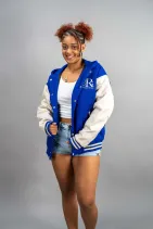 Classic Varsity Jacket 24 Reign Gear women's blue and white water-repellent varsity jacket.