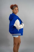 Classic Varsity Jacket 25 Reign Gear women's blue and beige water-repellent hooded varsity jacket