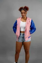 Classic Varsity Jacket 16 Reign Gear women's pink and blue water-repellent varsity jacket.